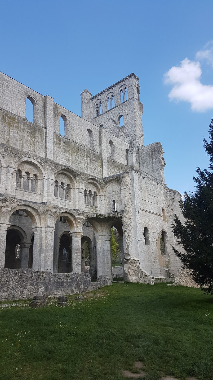 the flank of Jumièges Abbey, with its Romanesque arcading on several levels