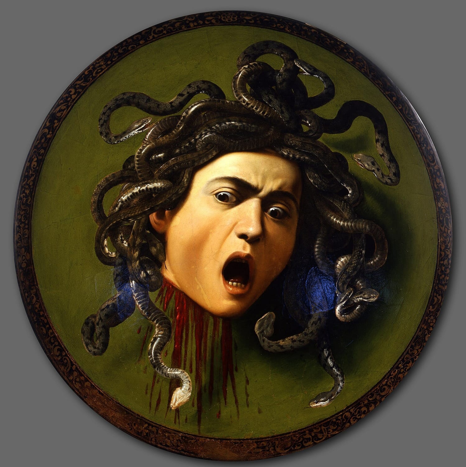 la medusa di caravaggio dipinta su uno scudo da parata convesso