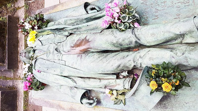 the statue of Victor Noir at Père-Lachaise in Paris